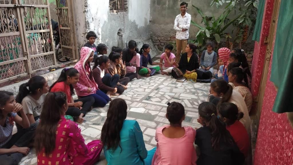 Community-meeting-with-adolescents-girls-1